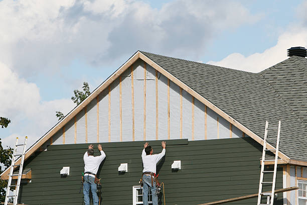 Professional Siding Installation technician working in Feasterville Trevose, PA